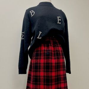 Initial knit sweater in black and white silver